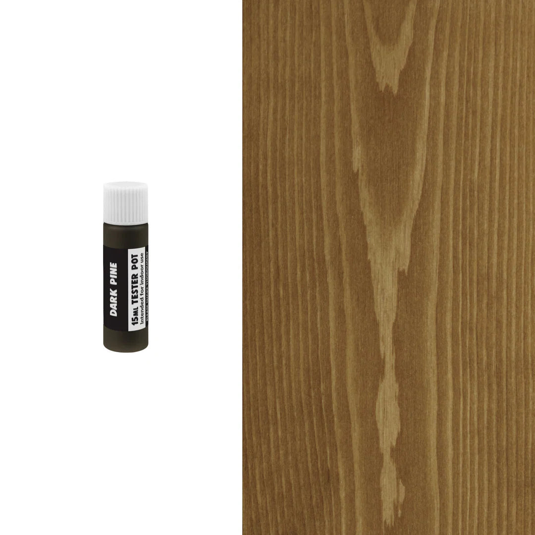 Dark pine wood sample with a small bottle labeled 'Dark Pine Tester Pot' on a white background