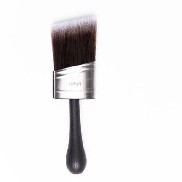 Paint brushes with black bristles and silver ferrules on a white background