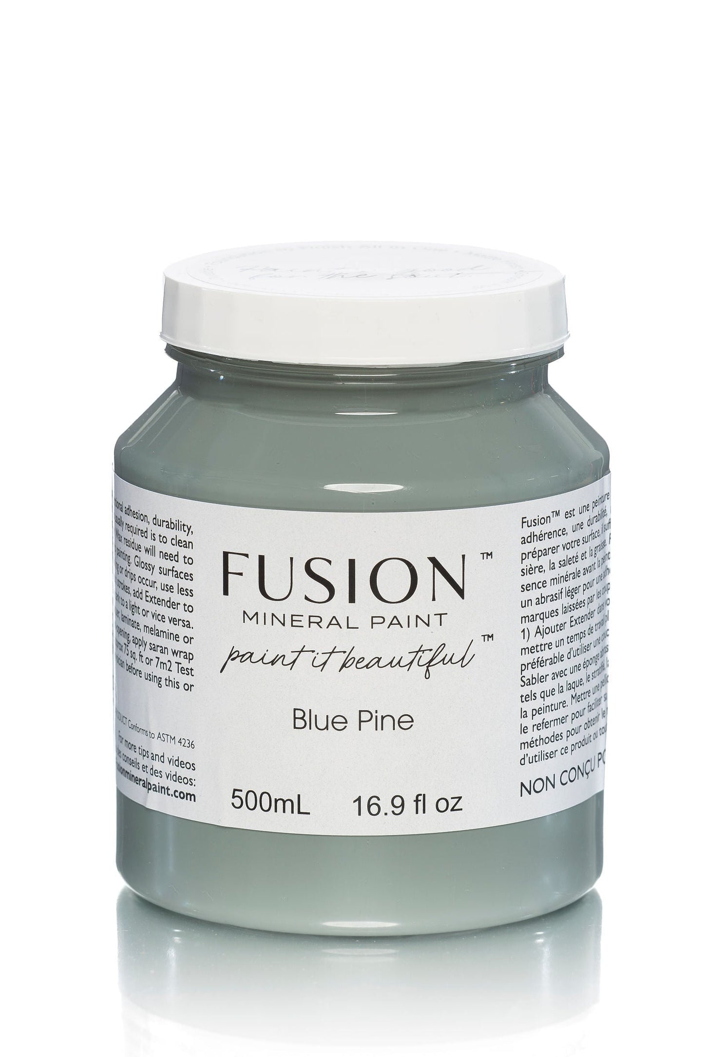 Jar of Fusion Mineral Paint in Blue Pine color on a white background