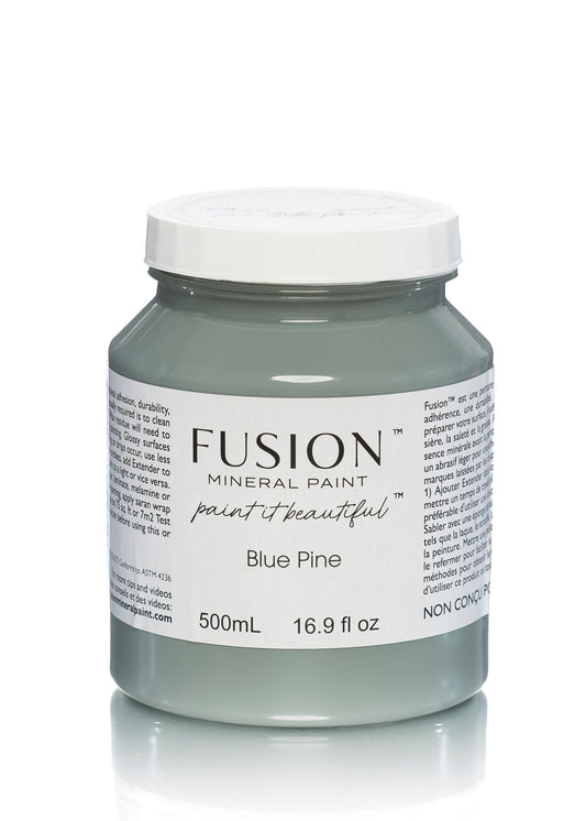 Jar of Fusion Mineral Paint in Blue Pine color on a white background