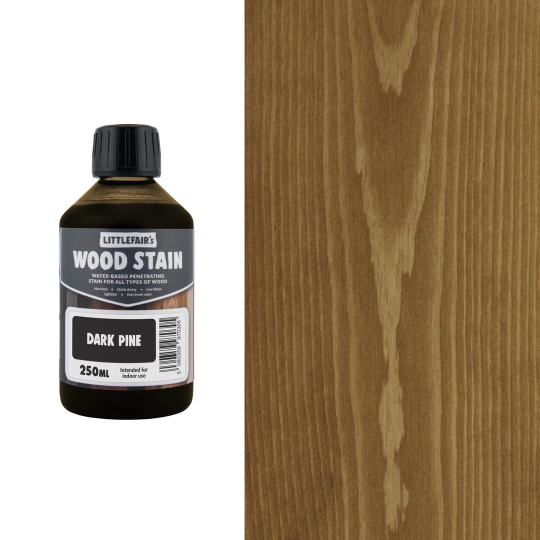 Bottle of Littlefain's Wood Stain with a sample applied to wood.