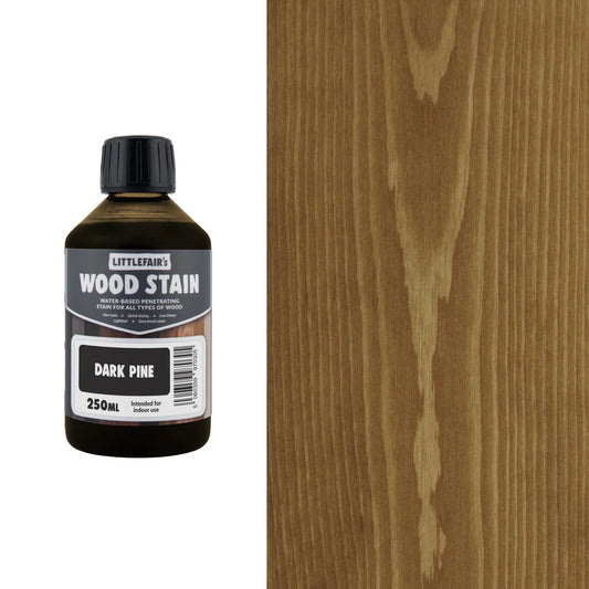 Bottle of Littlefain's Wood Stain with a sample applied to wood.