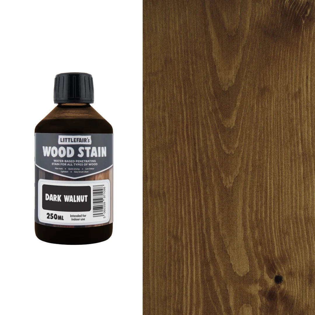 Bottle of Littlefain's Wood Stain in Dark Walnut color next to a wood sample.
