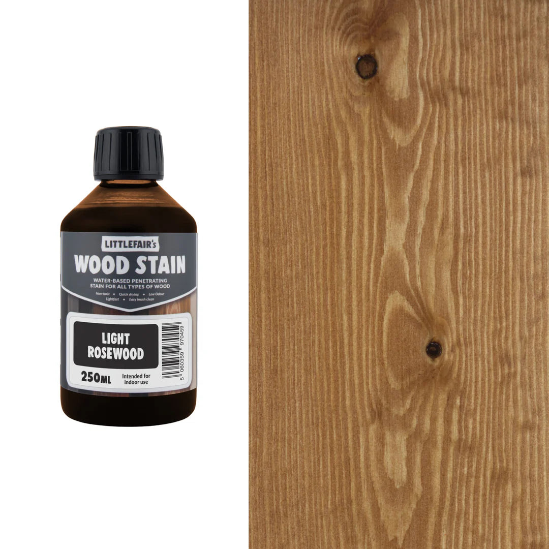 Bottle of Littlefair's Wood Stain next to a wooden surface