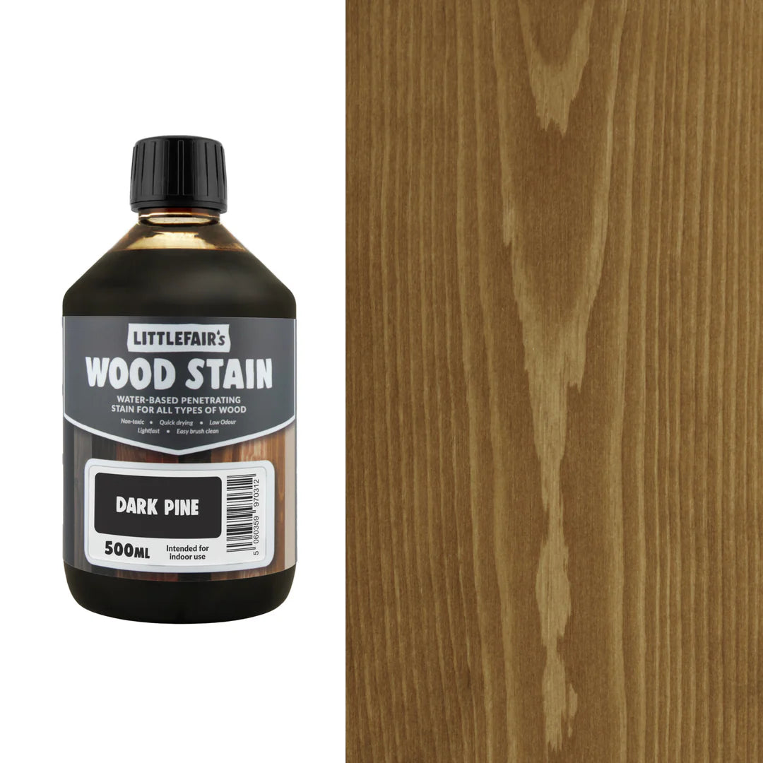 Bottle of Littlefair's Wood Stain next to a wooden surface