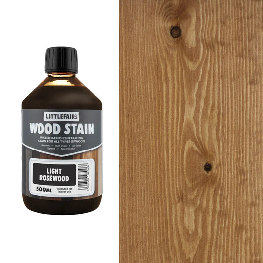Bottle of Littlefair's Wood Stain next to a wooden surface