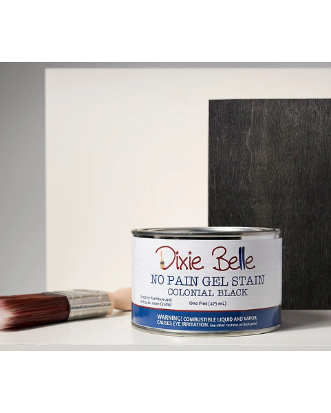 Dixie Belle No Pain Gel Stain can with Colonial Black sample and brush on a white background