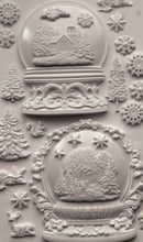 Load image into Gallery viewer, Decorative design of snow globes and winter elements on a textured background