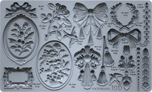 Load image into Gallery viewer, Decorative mold with floral, butterfly, and wreath designs on a gray background
