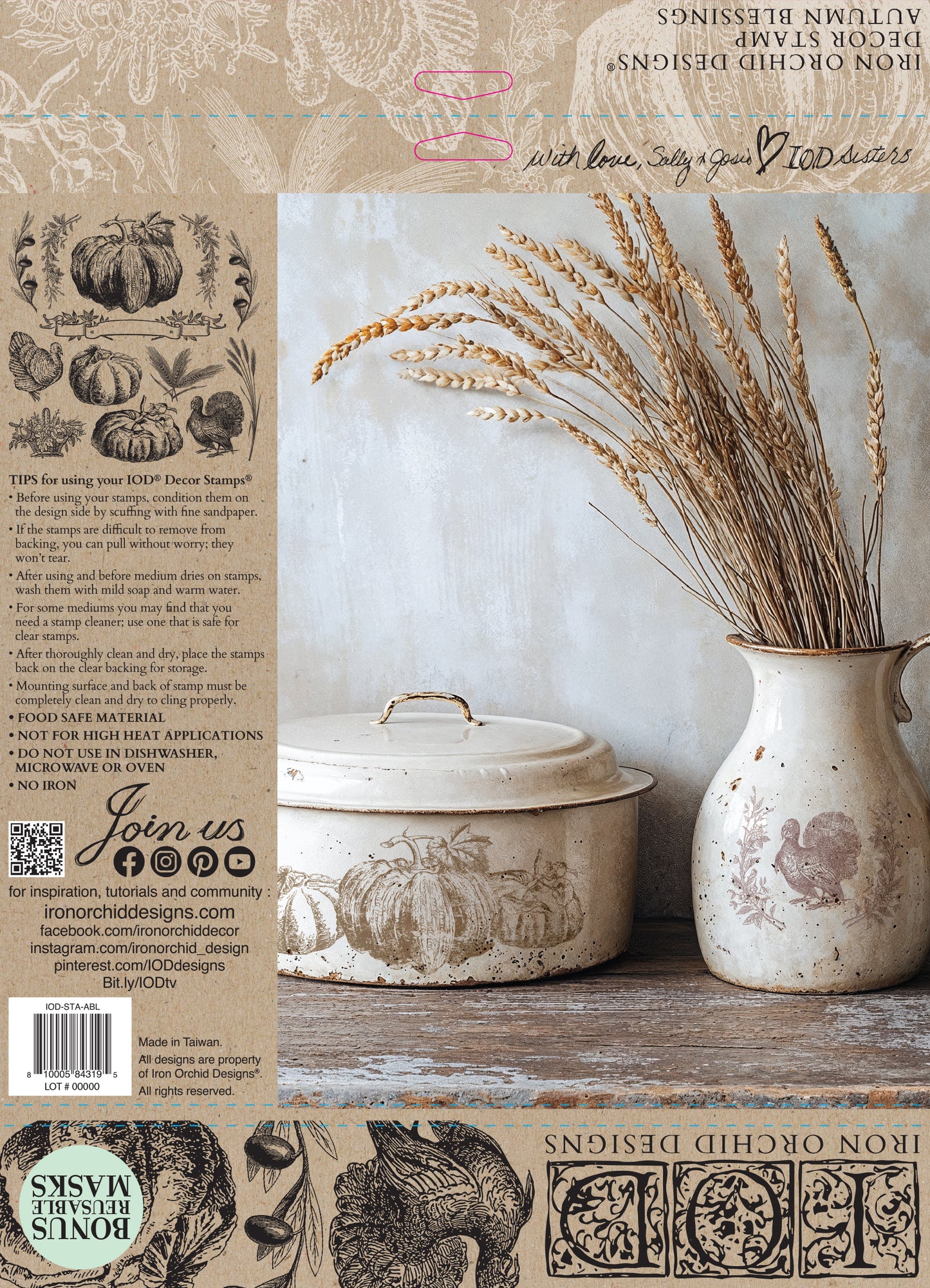 Decorative items including a ceramic jar and a vase with wheat on a the packaging for Iron Orchid Designs Stamp
