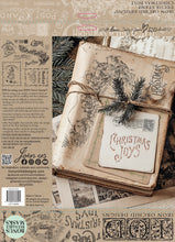 Load image into Gallery viewer, Decorative paper with &#39;Christmas Joys&#39; text, tied with twine, on a textured background with stamps and designs.