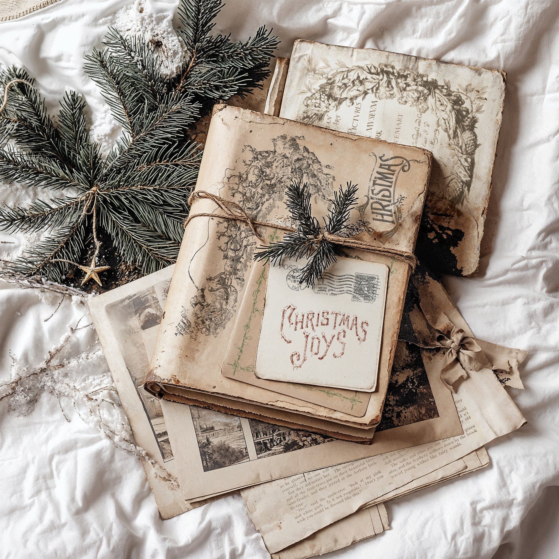 Stack of vintage books with Christmas decorations on  white using IOD Stamps