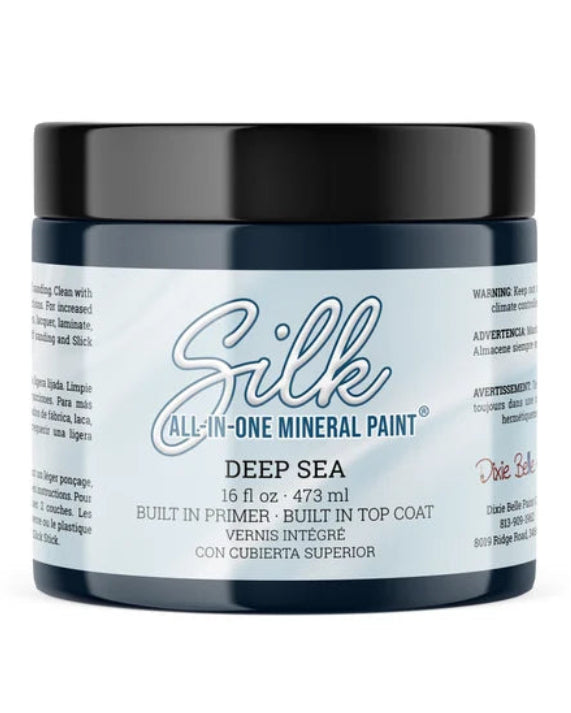 Jar of Silk All-in-One Mineral Paint in Deep Sea color on a white background