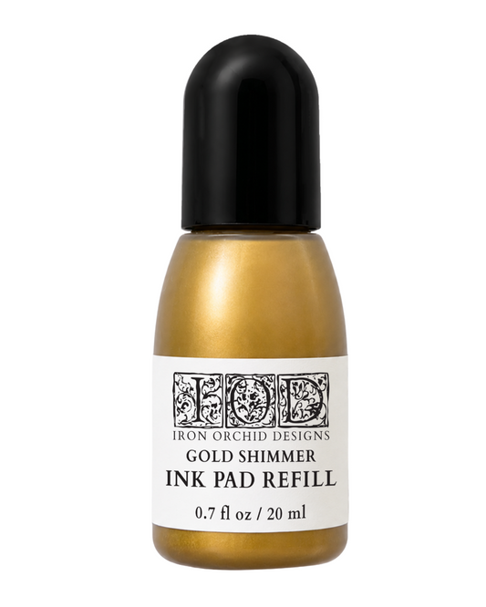 Iron Orchid Designs Gold Shimmer Ink Pad Refill in a 0.7 fl oz bottle with a black cap and white label, on a white background.