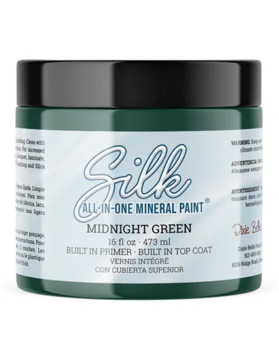 Jar of Silk All-in-One Mineral Paint in Midnight Green on a white background