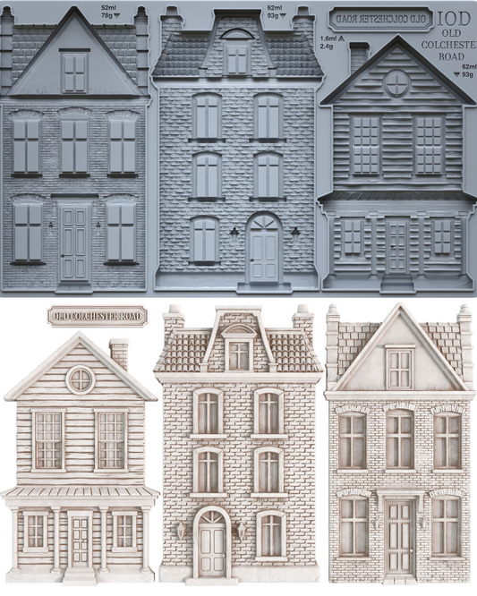 A set of miniature Victorian-style house molds and cutouts, including a gray metal mold tray at the top and three finished light beige house cutouts below on a white background.